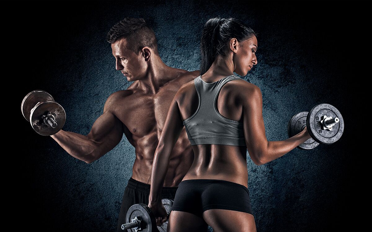 Boy and girl lifting weights